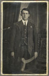 Photograph of Hedd Wyn and a poem, 'Y Wawr' ('The Dawn') in his hand Photograph of Hedd Wyn and a poem, 'Y Wawr' ('The Dawn') in his hand